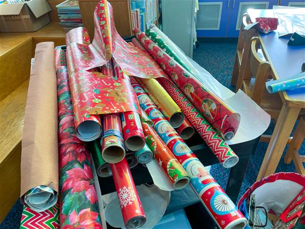 The MCB Complex and its volunteers also had a wrapping station available if any CPS family member wanted to use it!